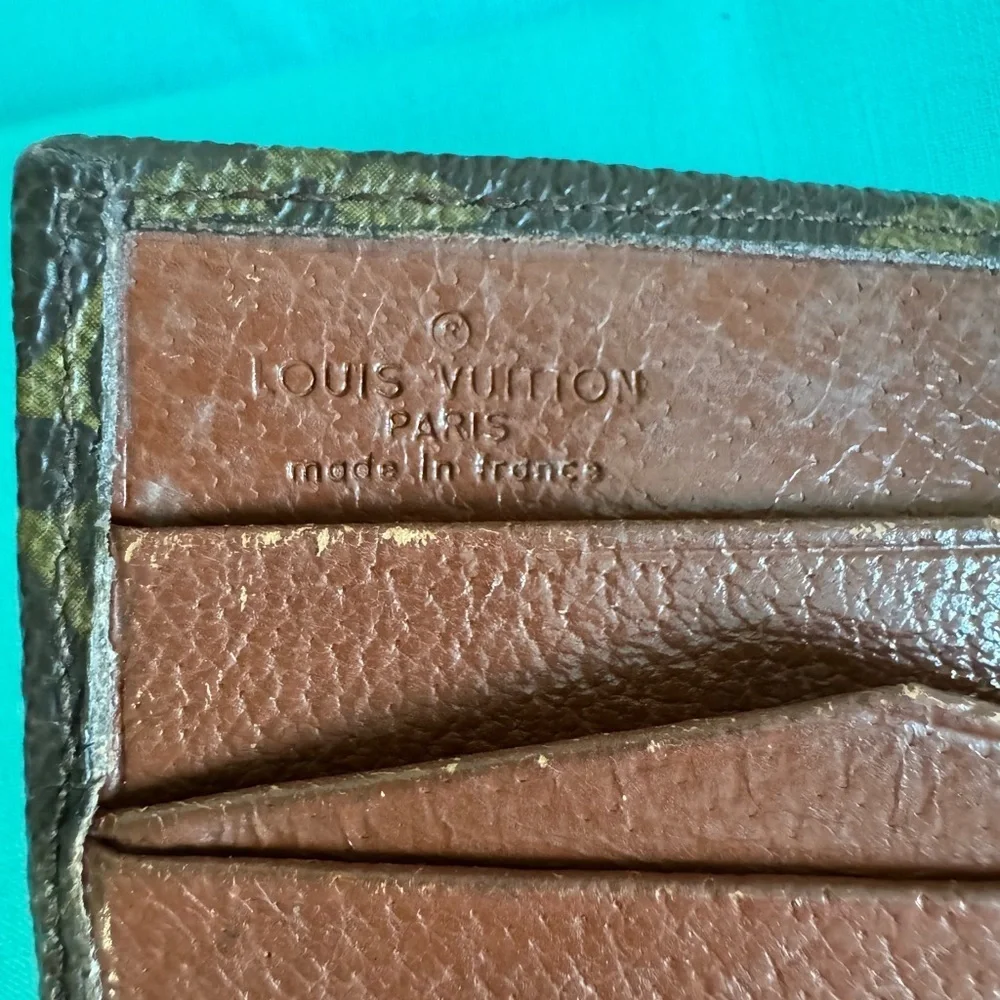Louis Vuitton Double. Snap Monogram Wallet